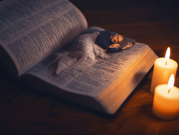 A person waking at dawn as light breaks through